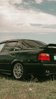 Black BMW E36 Sedan Tuner Drift Car Mobile Phone Wallpaper