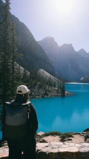 Stunning Moraine Lake View with Hiker Adventure Mobile Wallpaper