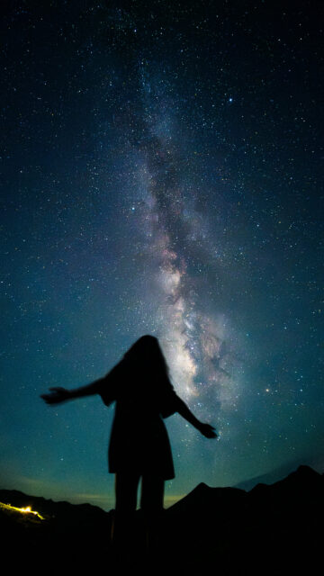 Cosmic Connection Celestial Energy and Galactic Manifestation Wallpaper