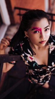 Beautiful Asian Woman with Artistic Pink Makeup Portrait Wallpaper