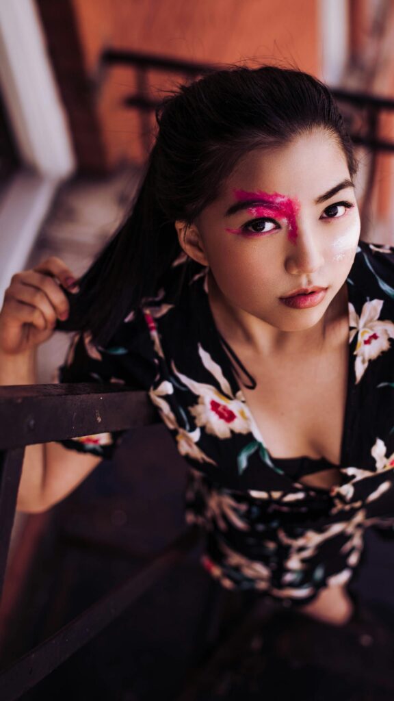 Beautiful Asian Woman with Artistic Pink Makeup Portrait Wallpaper