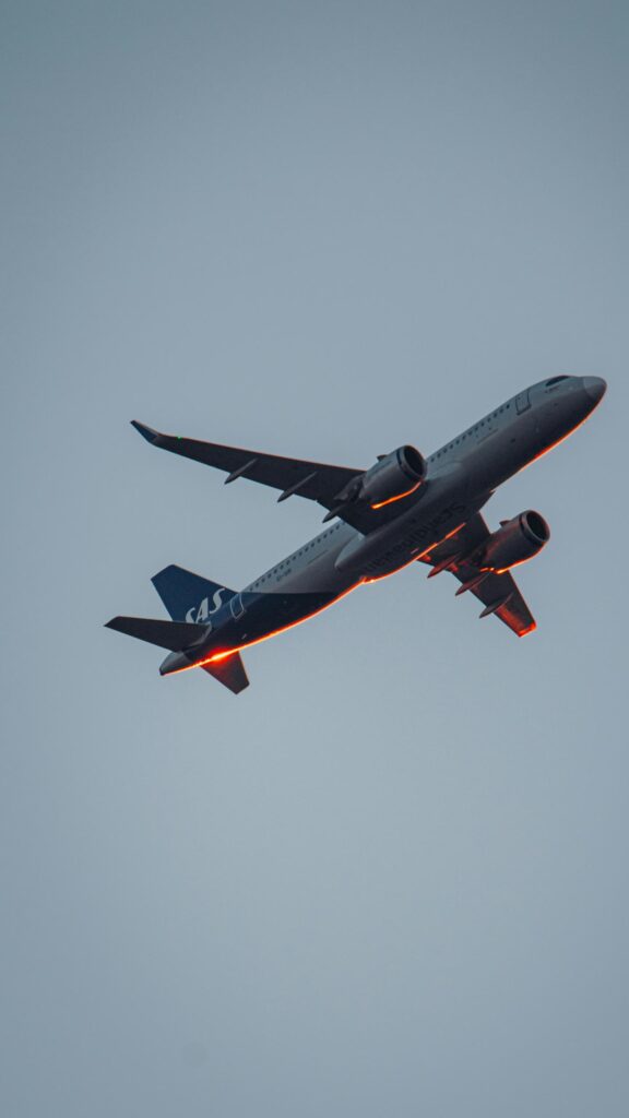 SAS Scandinavian Airlines Jet Plane at Sunset Mobile Wallpaper