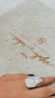 Elegant Wedding Keepsake with Pearls and Ring Mobile Wallpaper