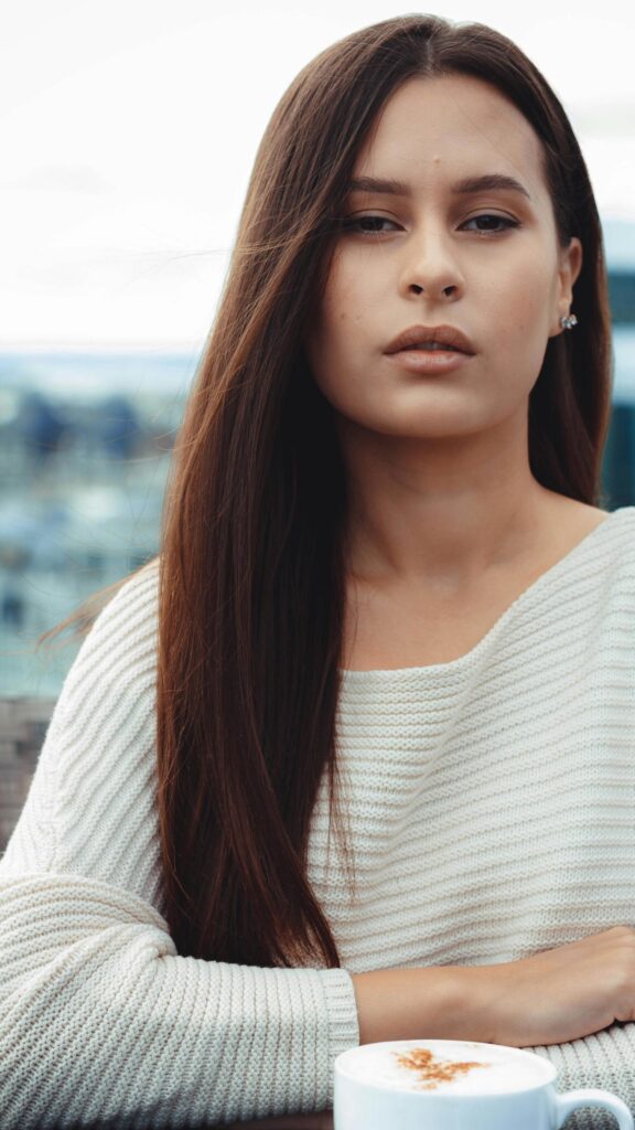 Beautiful Woman in White Sweater Drinking Coffee Aesthetic Wallpaper