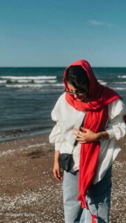 Woman in Red Scarf at the Beach Mobile Wallpaper