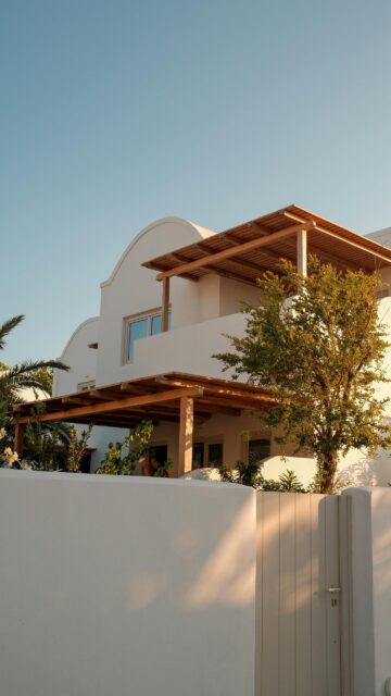 Mediterranean White Villa with Wooden Pergola Sunset Mobile Wallpaper