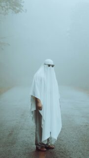 Funny Ghost Wearing Sunglasses in Misty Foggy Road Mobile Wallpaper