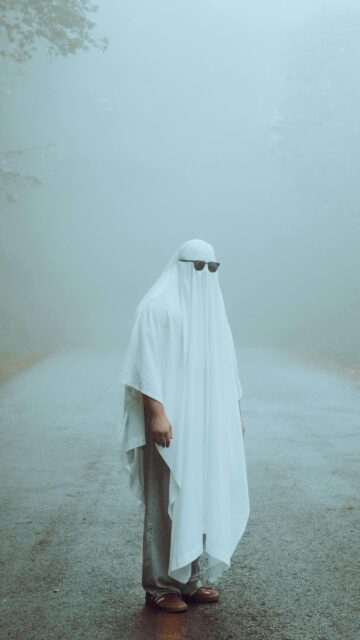 Funny Ghost Wearing Sunglasses in Misty Foggy Road Mobile Wallpaper