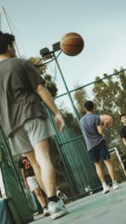Dynamic Basketball Court Action Shot Mobile Phone Wallpaper