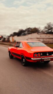 Vibrant Red Vintage Chevrolet Opala SS Muscle Car Phone Wallpaper