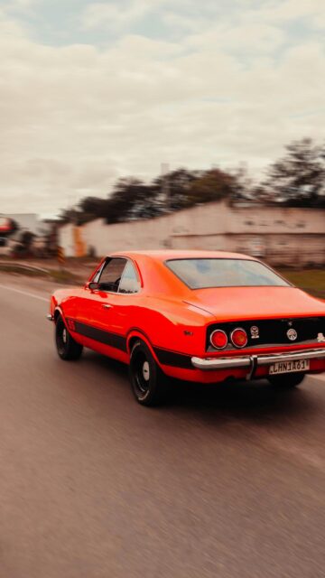 Vibrant Red Vintage Chevrolet Opala SS Muscle Car Phone Wallpaper