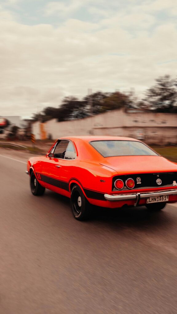 Vibrant Red Vintage Chevrolet Opala SS Muscle Car Phone Wallpaper
