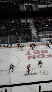 High-Angle Ice Hockey Game Action Shot Mobile Wallpaper