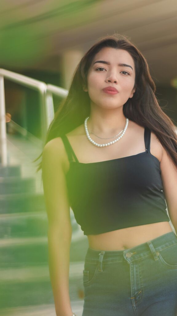 Beautiful Young Woman with Pearl Necklace Portrait Phone Wallpaper