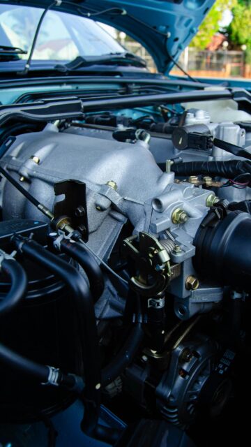 Detailed Mazda Miata Engine Bay Close-up Mobile Wallpaper