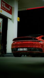 Red Porsche 911 at Gas Station Night Phone Wallpaper