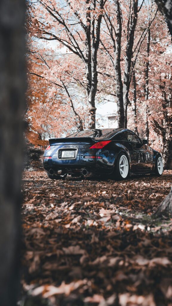 Nissan 350Z Sports Car in Autumn Forest Aesthetic Phone Wallpaper