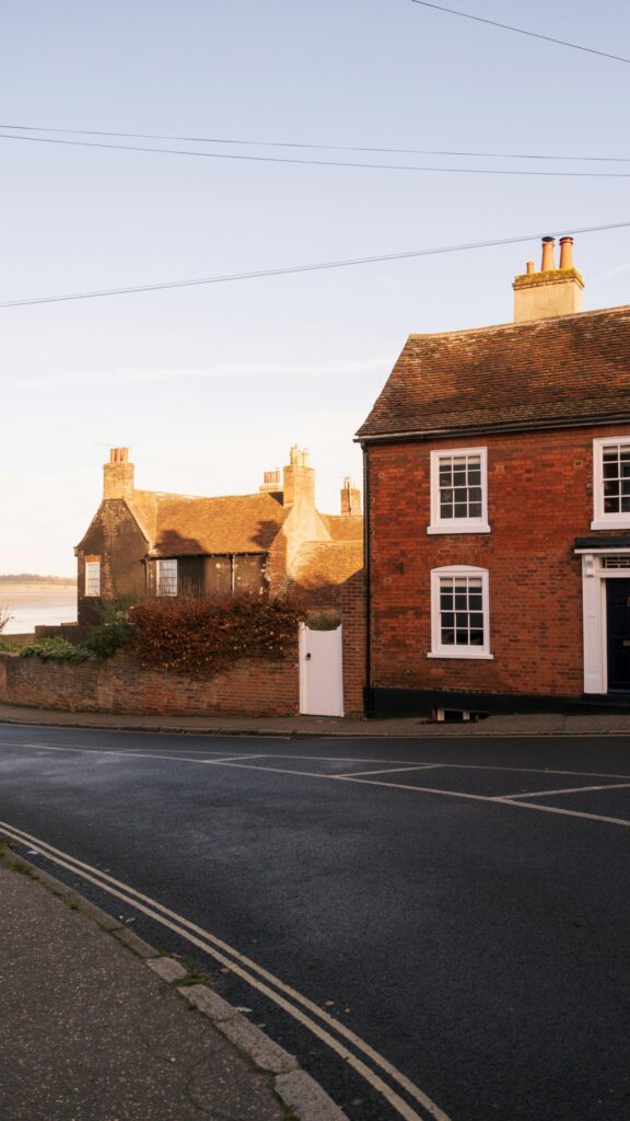 Charming English Brick Cottage Street Scene Phone Wallpaper