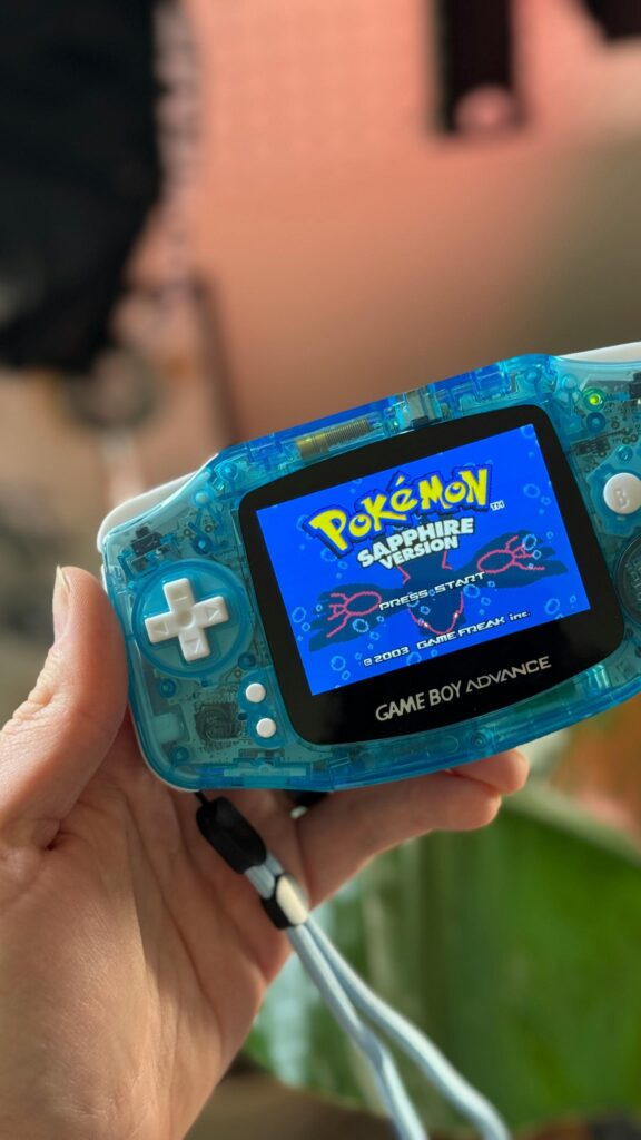 Blue Transparent Game Boy Advance Playing Pokemon Sapphire Wallpaper