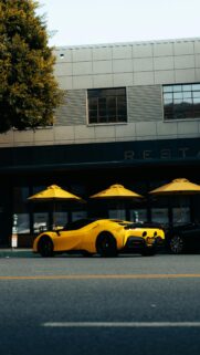 Yellow Ferrari SF90 Stradale Supercar Street Parking Phone Wallpaper
