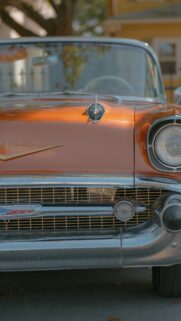 Vintage Orange Chevrolet Classic Car Front View Phone Wallpaper