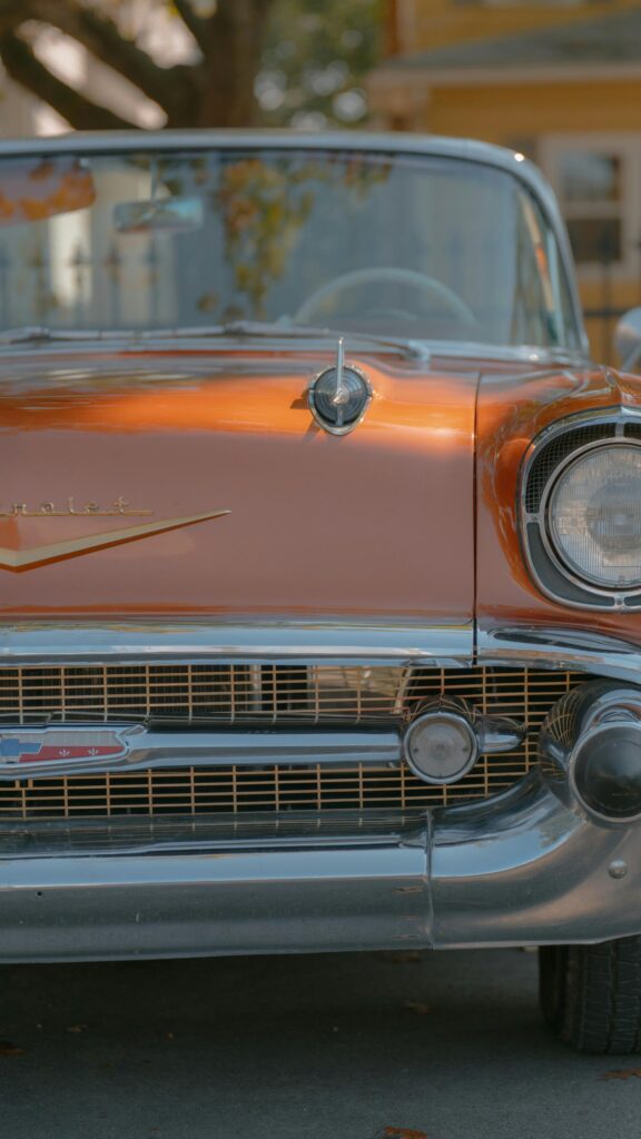 Vintage Orange Chevrolet Classic Car Front View Phone Wallpaper