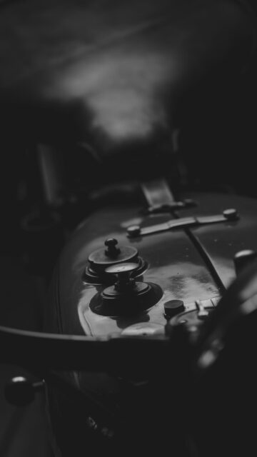 Close-up Vintage Motorcycle Dashboard Aesthetic Black and White Wallpaper