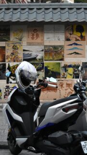 Urban Scooter and Artistic Mural Aesthetic Phone Wallpaper