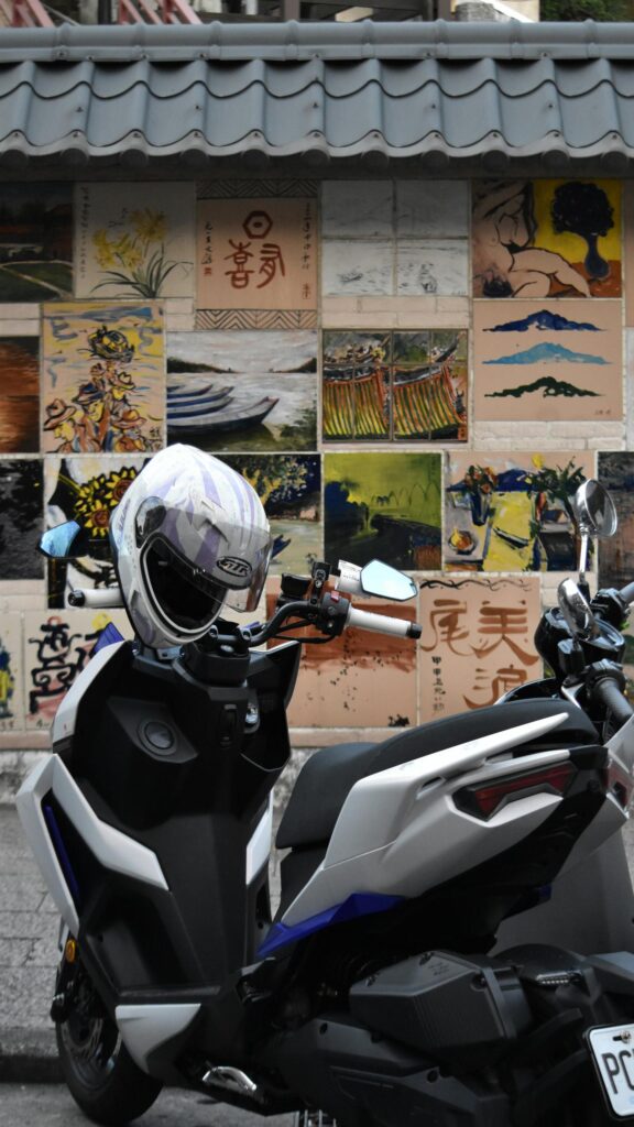 Urban Scooter and Artistic Mural Aesthetic Phone Wallpaper