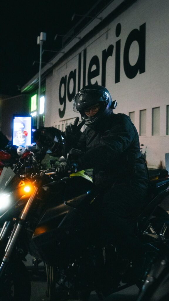 Biker Making Peace Sign Night Ride Motorcycle Phone Wallpaper