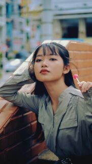 Beautiful Asian Girl with Lollipop Cinematic Portrait Mobile Wallpaper