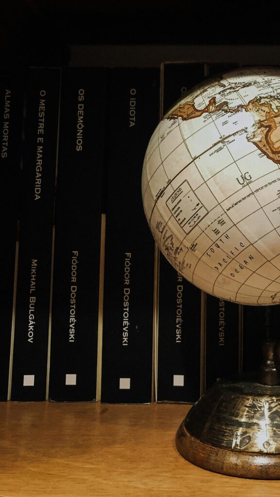 Literary World Globe Aesthetic Dark Academia Phone Wallpaper