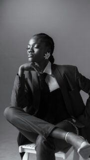 Elegant African Model in Black Suit Fashion Portrait Mobile Wallpaper