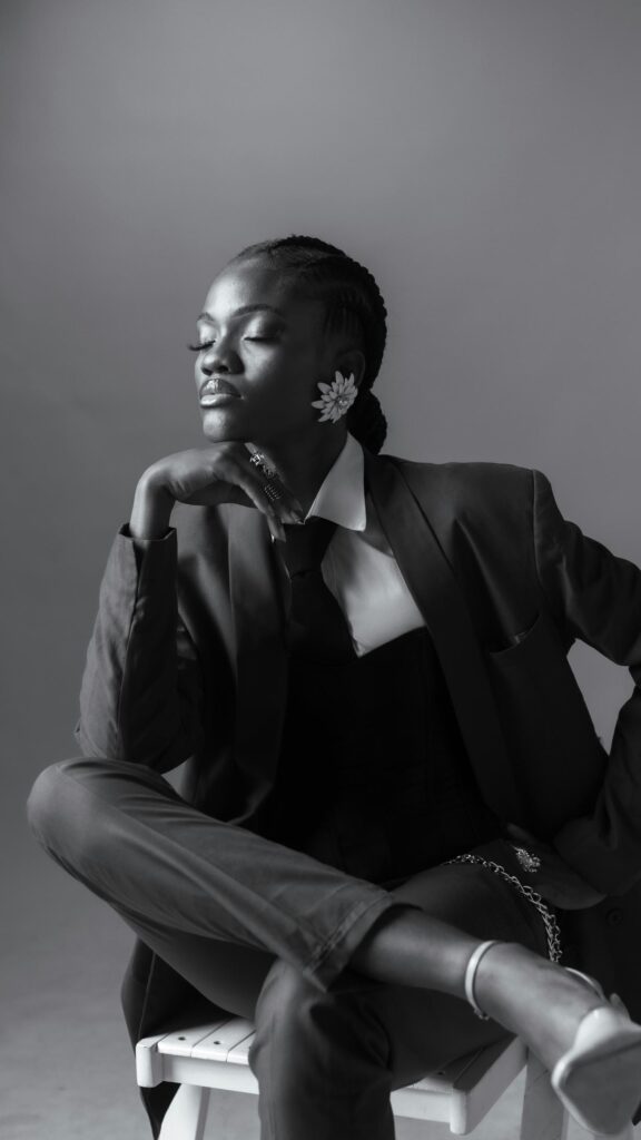 Elegant African Model in Black Suit Fashion Portrait Mobile Wallpaper