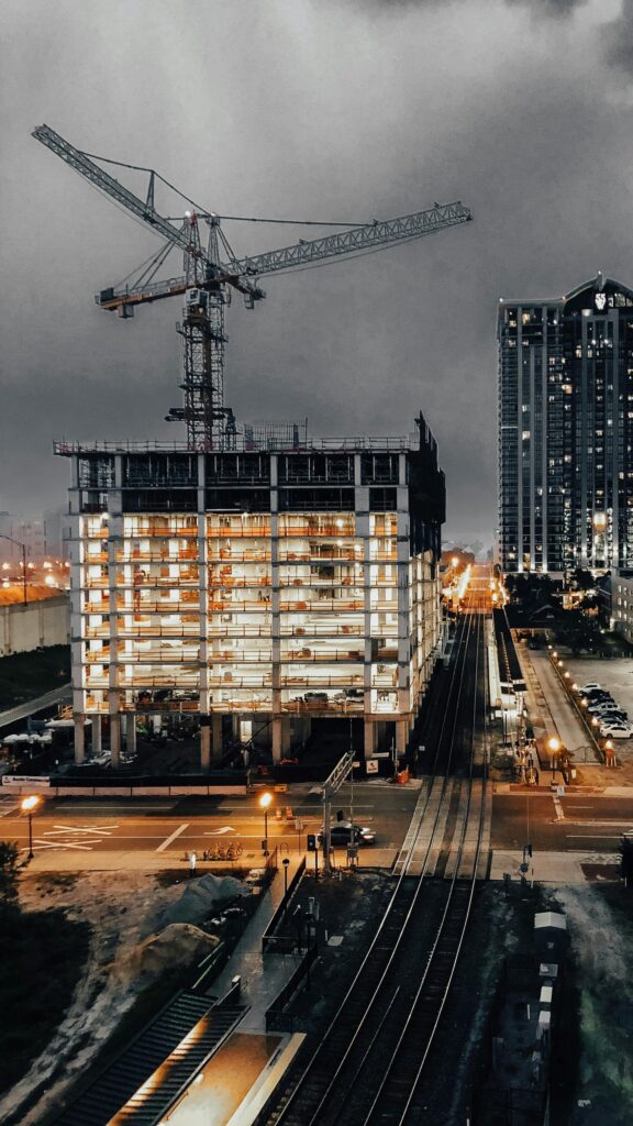 Dramatic Construction Site Urban Skyline at Night Phone Wallpaper