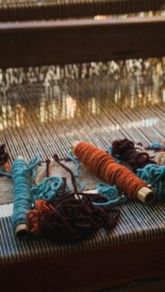 Artisanal Handloom Textile Craft Rustic Yarn Spools Wallpaper