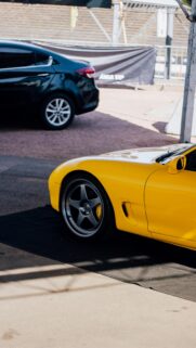 Stunning Yellow Mazda RX-7 Sportscar Close Up Mobile Wallpaper