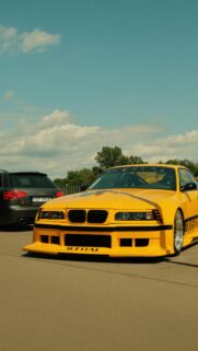 Custom Yellow BMW E36 Drift Coupe and Audi RS4 Sport Car Wallpaper