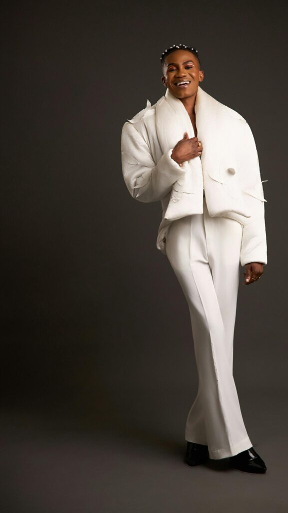 Elegant Black Man in White Fashion Suit Portrait Mobile Wallpaper