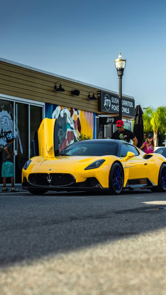 Stunning Yellow Maserati MC20 Supercar Parked at Sushi Restaurant Wallpaper