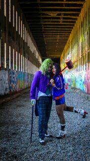 Joker and Harley Quinn Cosplay Couple in Graffiti Tunnel Wallpaper