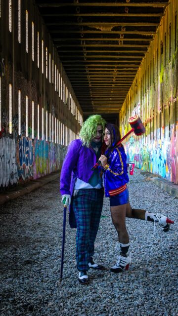Joker and Harley Quinn Cosplay Couple in Graffiti Tunnel Wallpaper