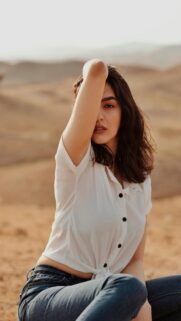 Stunning Portrait of a Woman in the Desert Mobile Wallpaper
