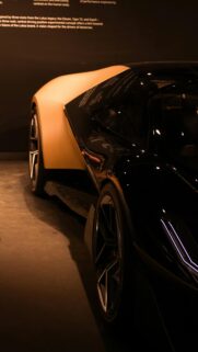 Futuristic Lotus Concept Supercar in Yellow and Black Mobile Wallpaper