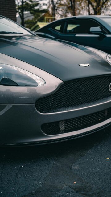 Stunning Aston Martin V8 Vantage Sportscar Front View Mobile Wallpaper