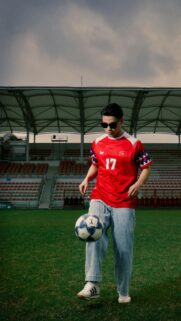 Cool Guy Playing Soccer in Vietnam Jersey Mobile Wallpaper