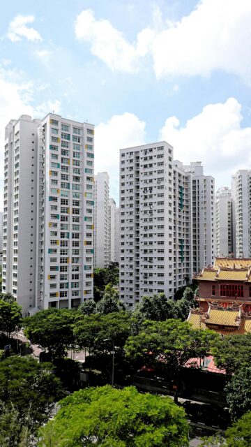 Stunning Singapore Urban Skyline and Traditional Temple Architecture Wallpaper