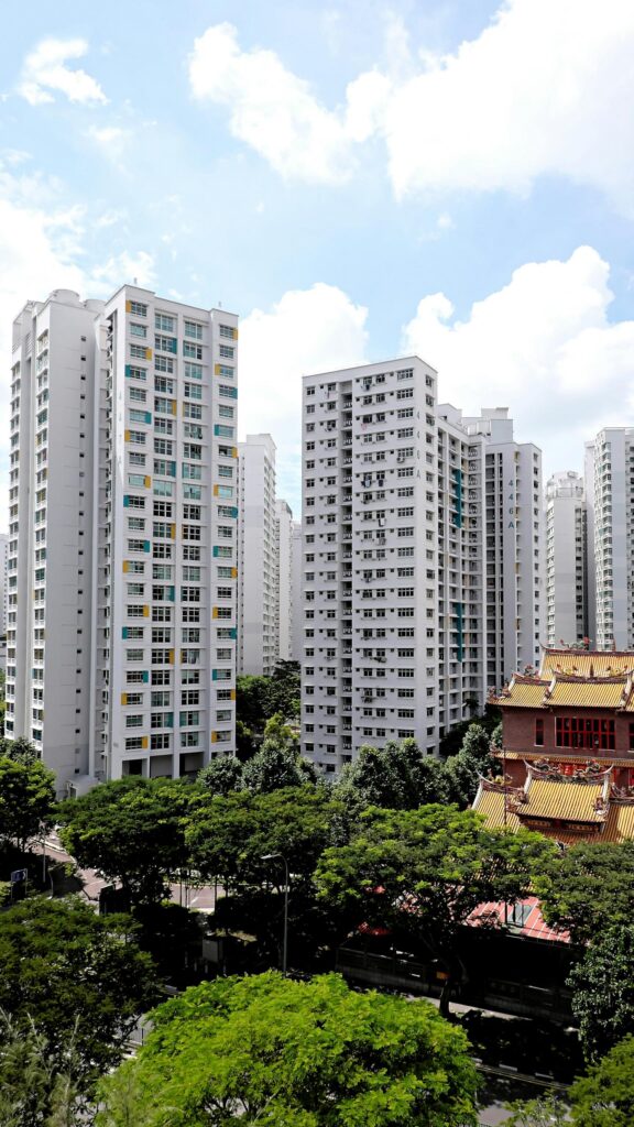 Stunning Singapore Urban Skyline and Traditional Temple Architecture Wallpaper