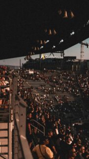 Stadium Crowd Atmosphere at Sunset Mobile Phone Wallpaper