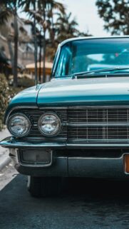 Vintage Teal Classic Car Front View High Resolution Phone Wallpaper